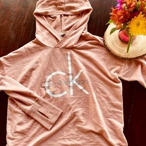 Pink Calvin Klein sweetheart with thumb holes.